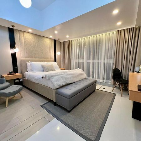 Hotel Vibe Condo At Uptown Parksuites Bgc Taguig Esterno foto
