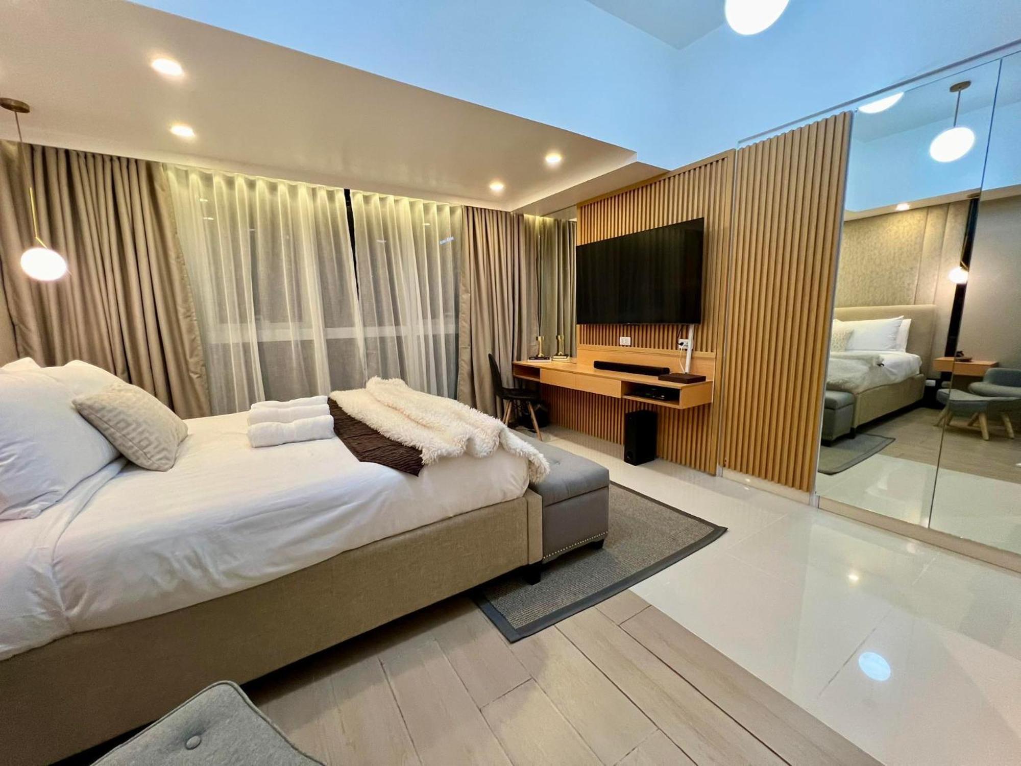Hotel Vibe Condo At Uptown Parksuites Bgc Taguig Esterno foto